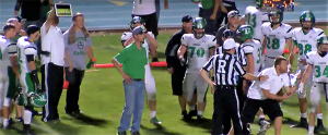 Contributed Photo/Courtesy iTalk 106.7: Thatcher head coach Sean Hinton argues the opposing player was down as an assistant coach attempts to show the officials the video stream of the game as proof. 