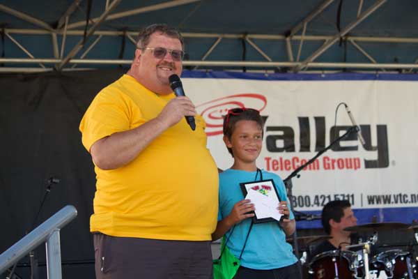 Jon Johnson Photo/Gila Valley Central: Chris Gibbs, here shown at SalsaFest, announced the Lions Club will issue food vouchers to assist flood victims. 