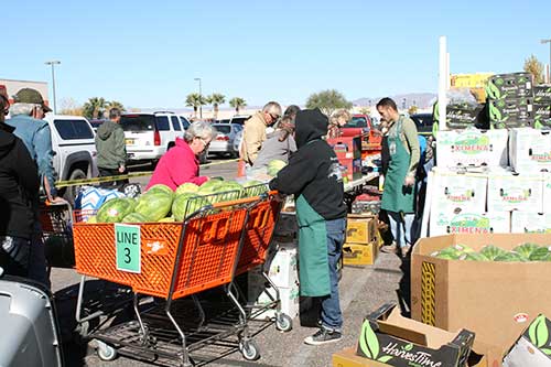 Brooke Curley Photo/ Gila Valley Central: Farmer's market attendees braved the brisk coolness Wednesday morning for the promise of produce. 