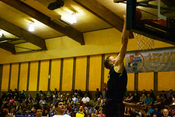 Jon Johnson Photo/Gila Valley Central: Pima's Jarrett Kartchner (4) throws down a dunk.