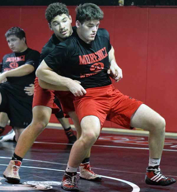 Photo By Raymundo Frasquillo: Morenci senior Christian White works on an escape with junior Jacob Vierra during a recent practice session. White is a two-time state and sectional champion with a combined 12-0 record with 10 pins in the four meets.