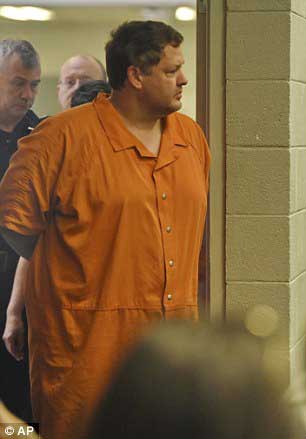 AP Photo: Todd Kohlhepp enters court after allegedly admitting to murder. 