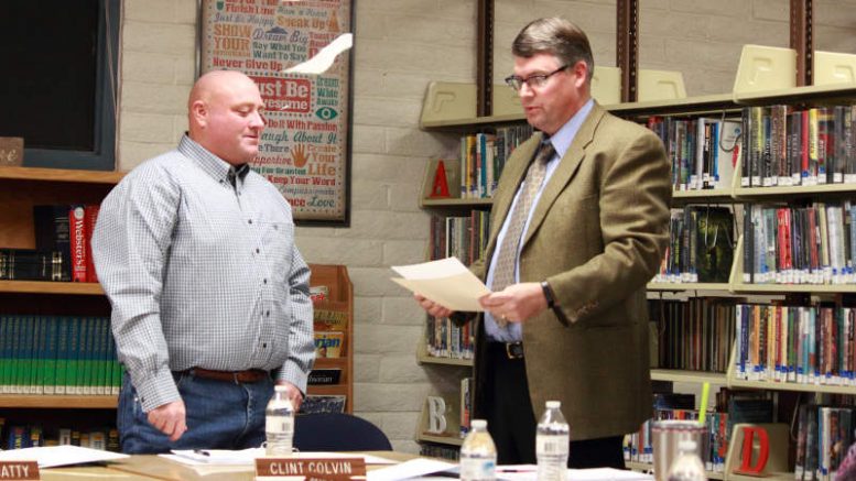 Eric Burk Photo/Gila Valley Central: Superintendent Rickert swears in newly elected school board member Clint Colvin.